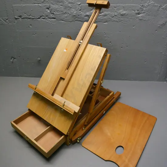 portable artist's easel and paint box, with brass hardware, leather handle H-700 as photographed, case L-550 W-400