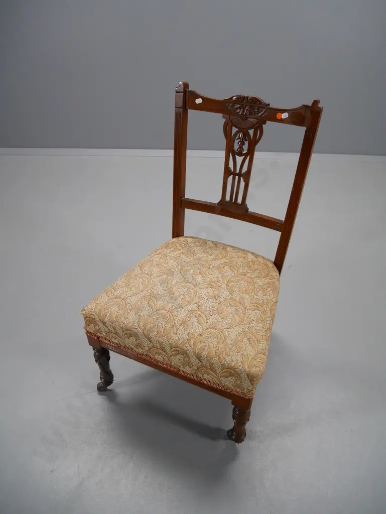 Edwardian carved back nursing chair with damask upholstered seat, on original casters - some movement H-770 W-450 D-430 Image 1++