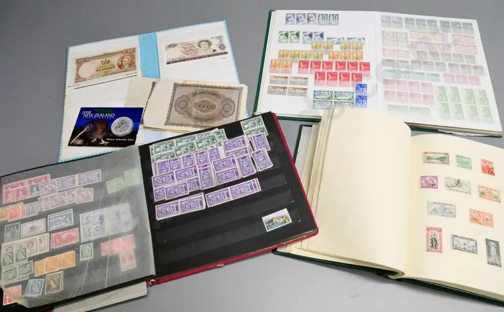 assorted stamp albums, coins and notes Image 1++
