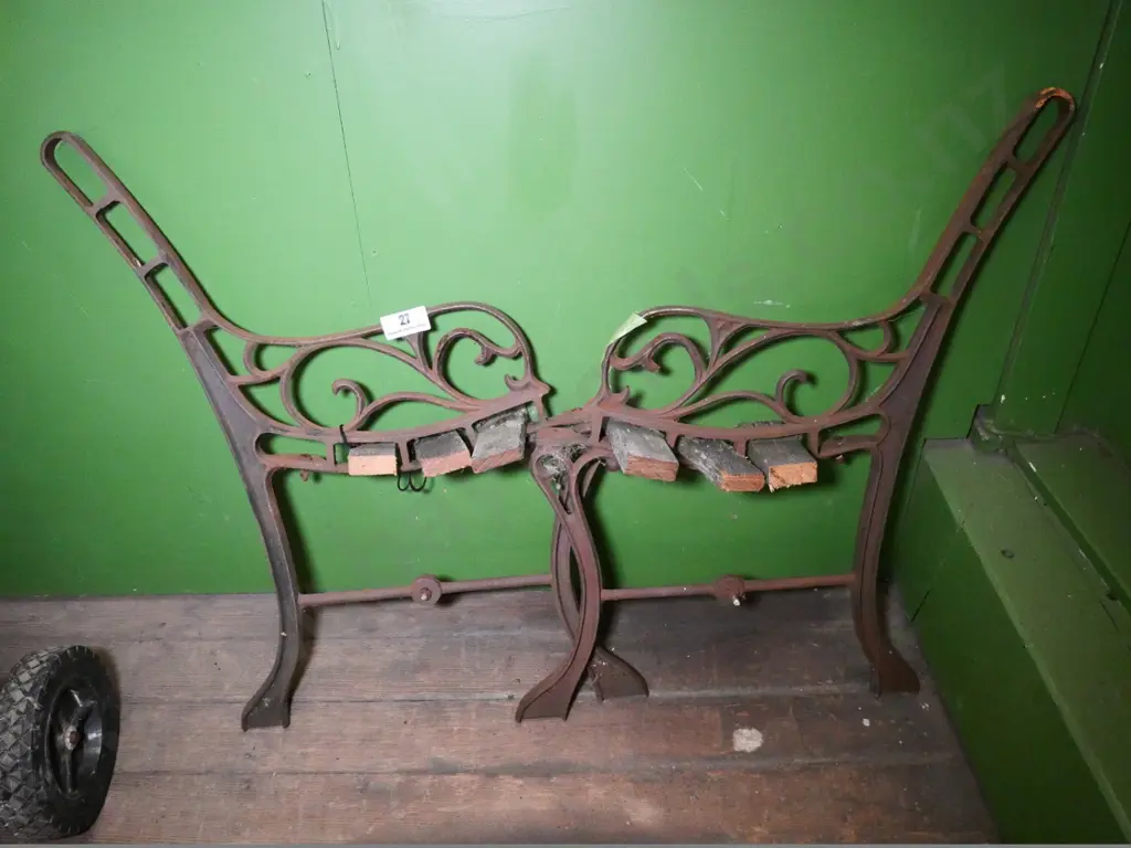pair of cast iron garden bench seat ends Image 1++
