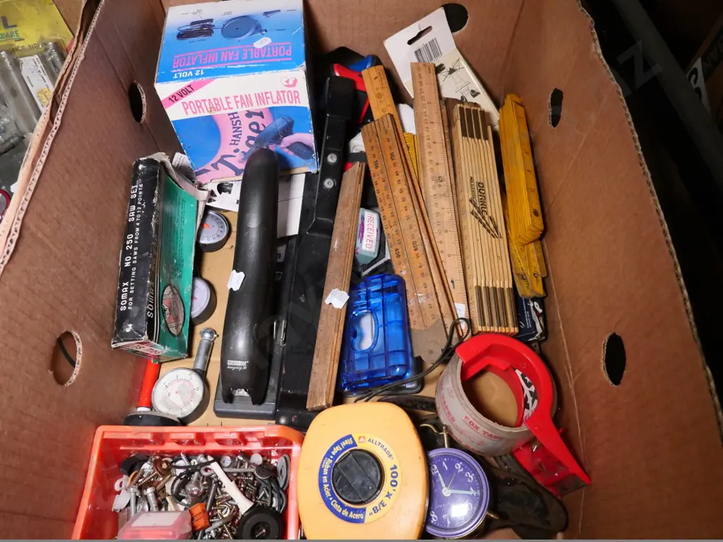 box of wooden rulers, staplers, tape measure, etc. Image 1++