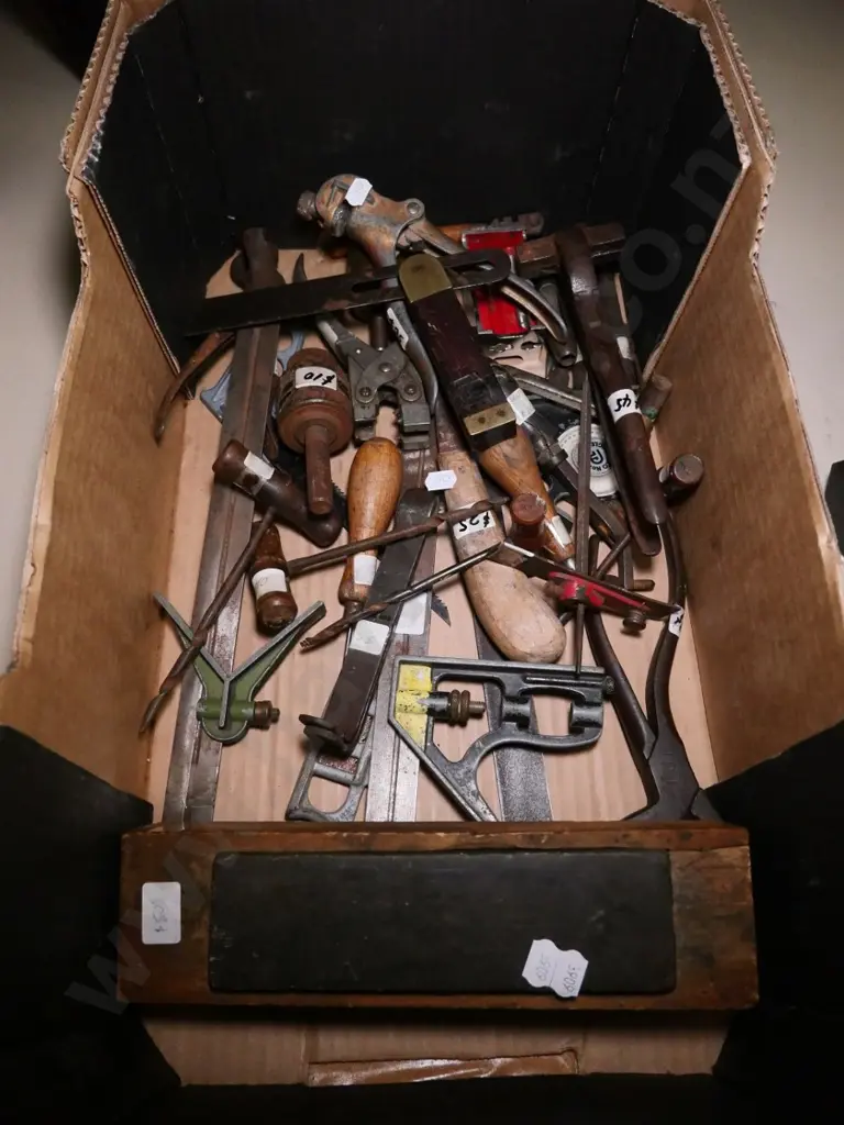 box of builder's squares, sharpening stones, nibblers, etc. Image 1++