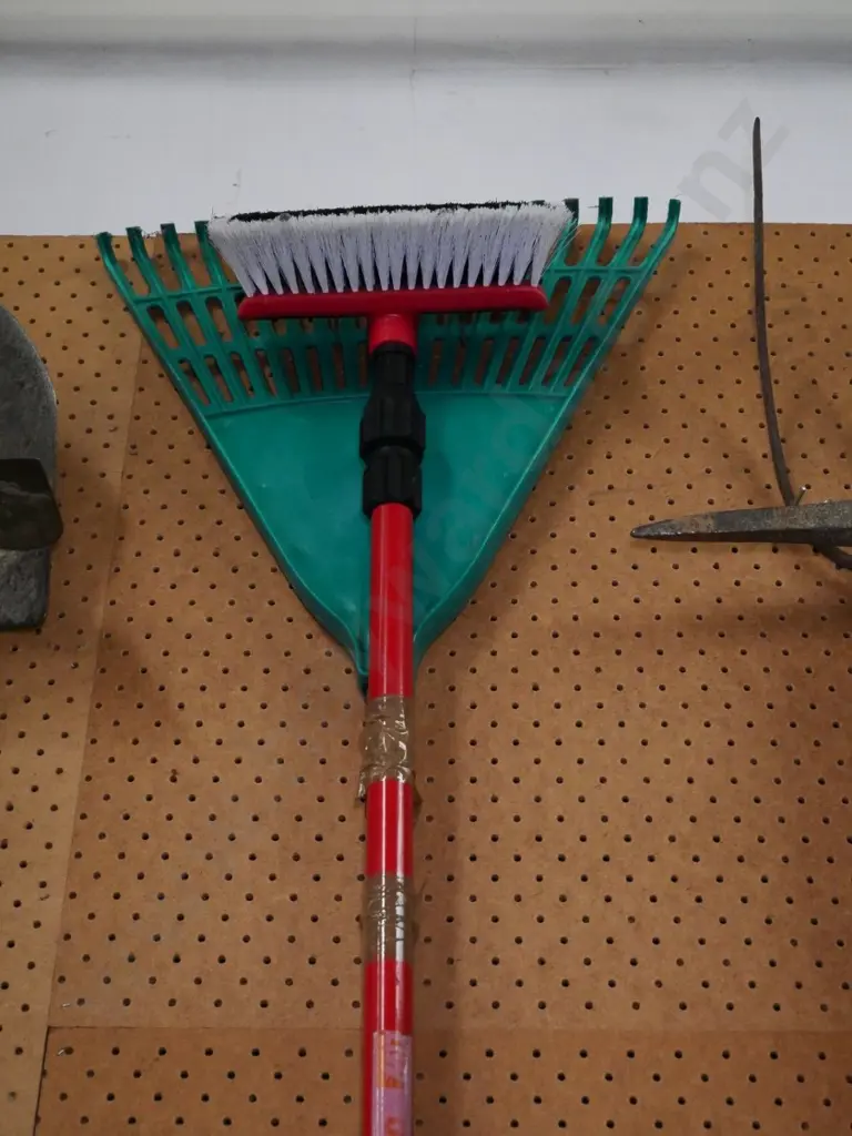 grass rake and a telescopic window brush Image 1++