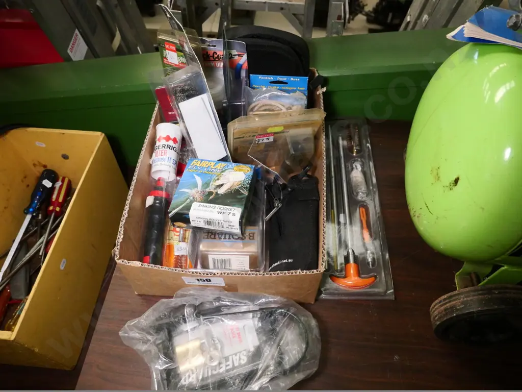 box of various hunting and fishing accessories Image 1++