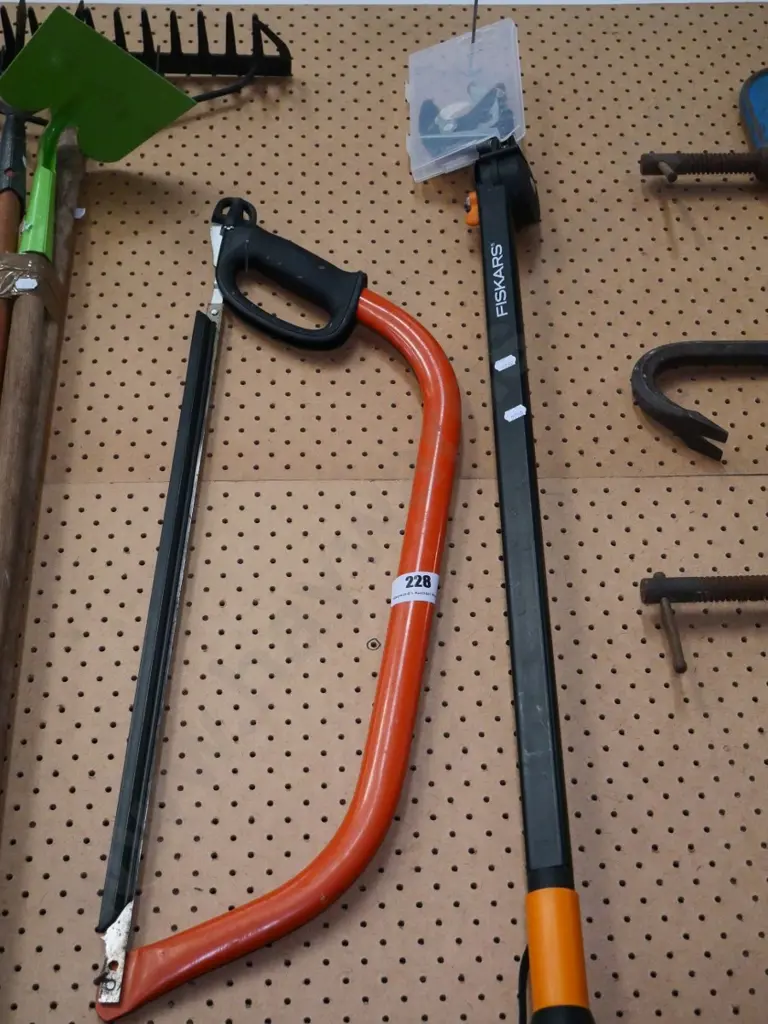 Fiskars pole pruner and a pruning saw Image 1++