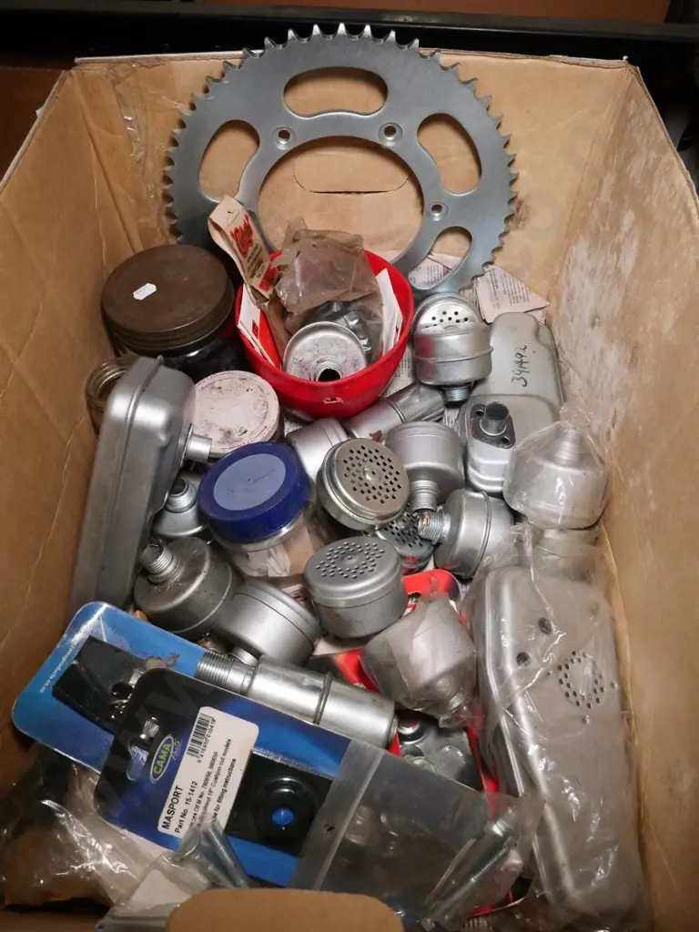 box of lawnmower parts, mufflers, etc. Image 1++