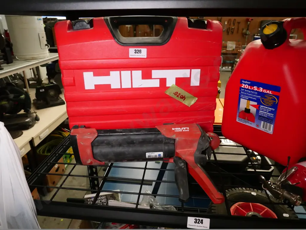 cased Hilti HDM500 caulking dispenser Image 1++