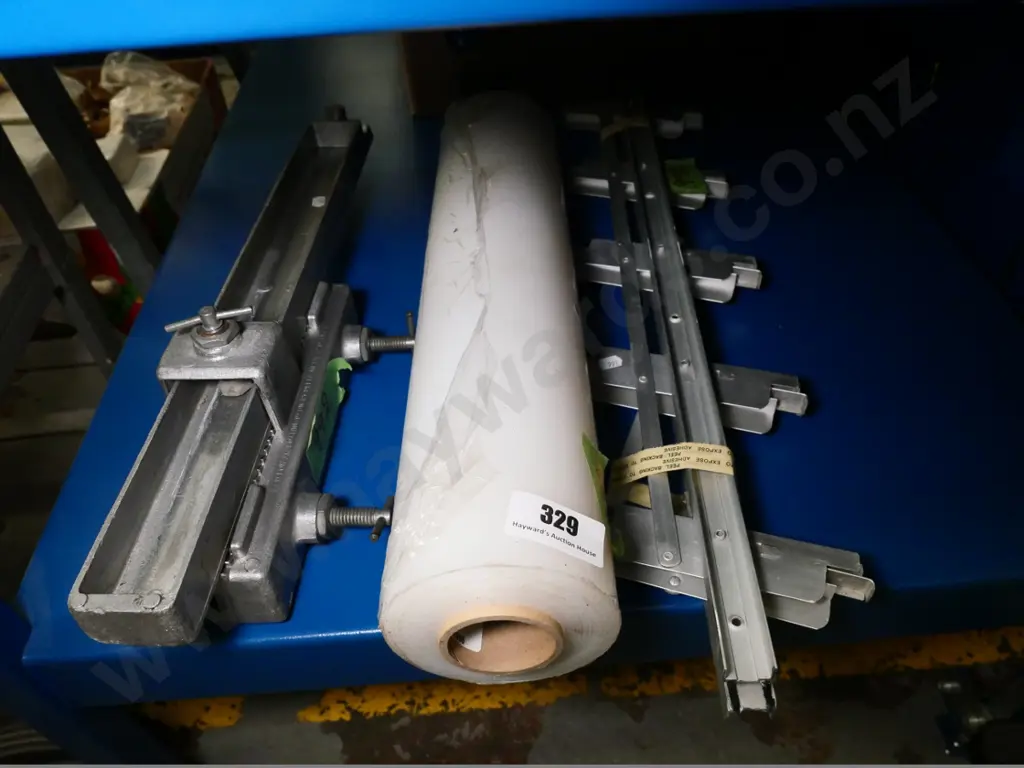 roll of plastic wrap, frames for window louvres, etc Image 1++