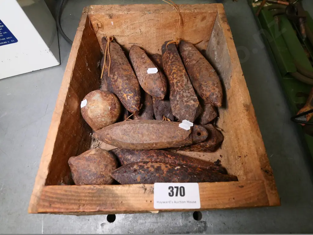 box of rusty window sash weights Image 1++