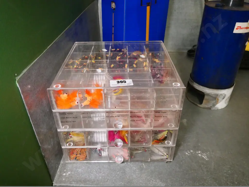 set of perspex drawers with numerous fishing lures Image 1++