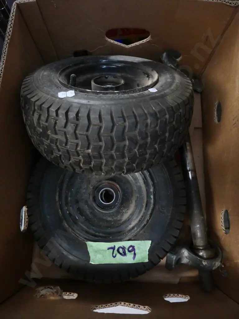 2 pneumatic tyres and an axle Image 1++