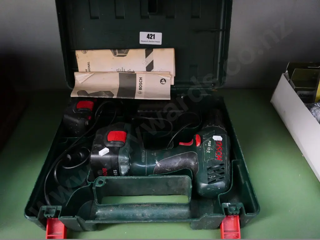 Bosch cased cordless drill and charger Image 1++
