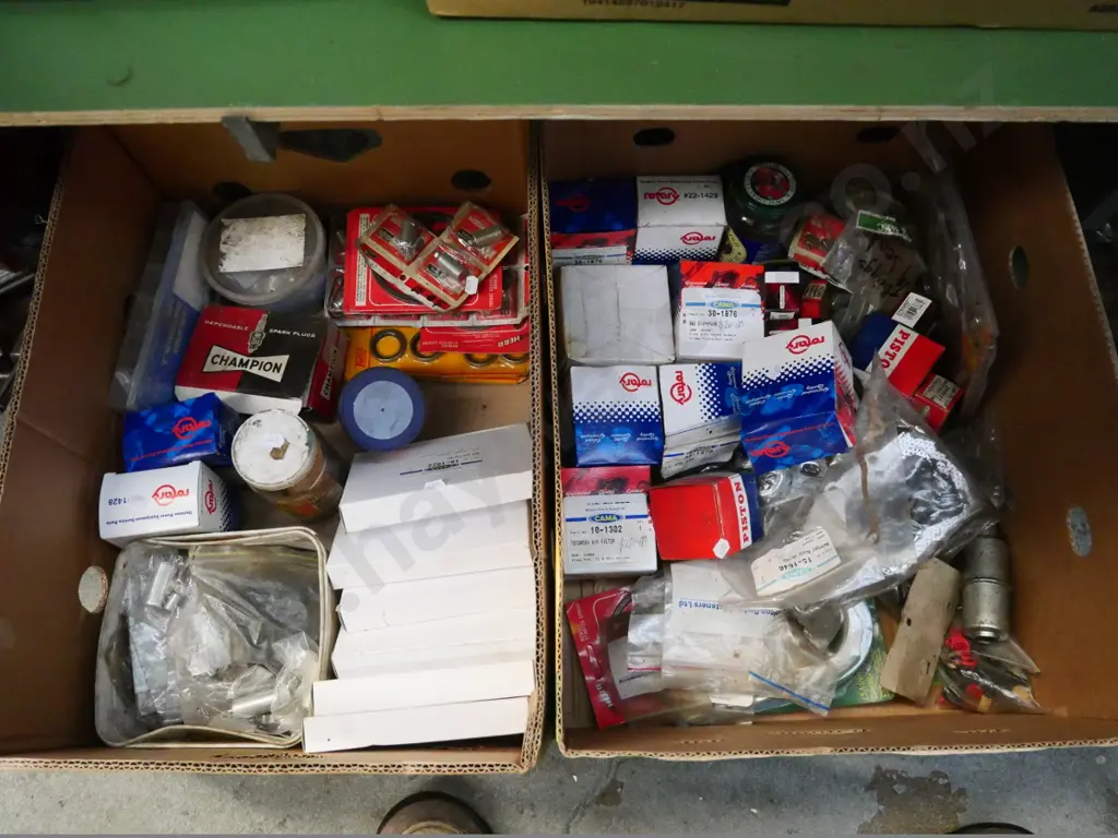 2 boxes of lawnmower accessories - blue dots Image 1++