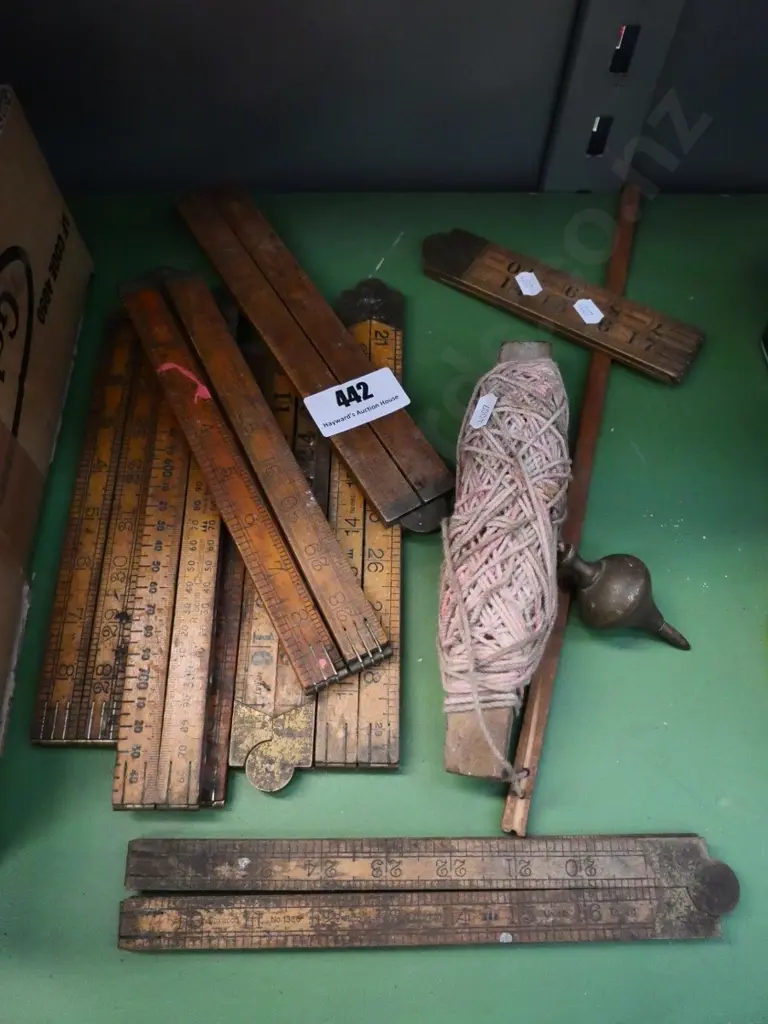 wooden builder's rules and vintage plumb bob Image 1++