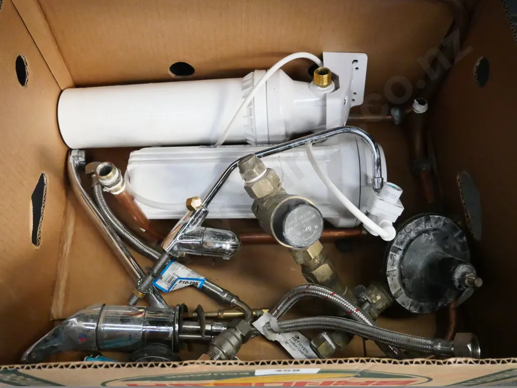 box of water filters, kitchen tap, valves, etc. Image 1++