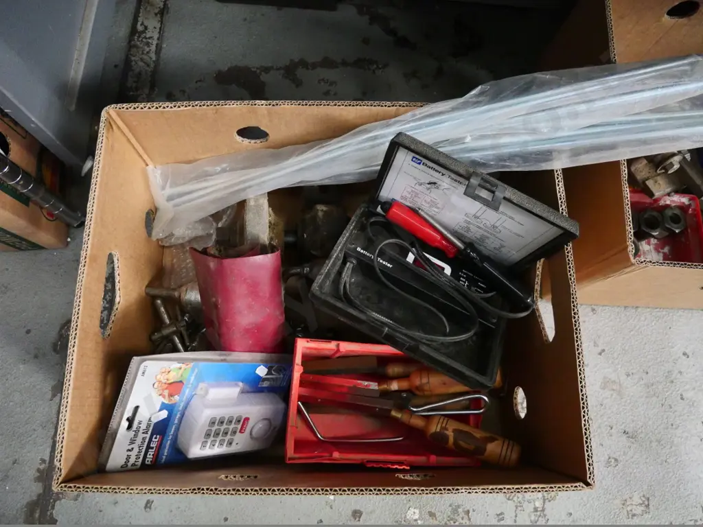 box of drill chucks, battery tester, auger bits, etc. Image 1++