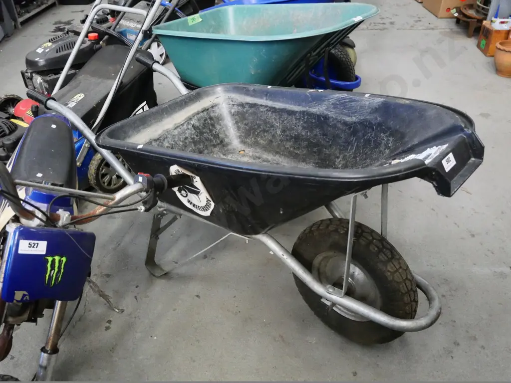black plastic contractor's wheelbarrow Image 1++