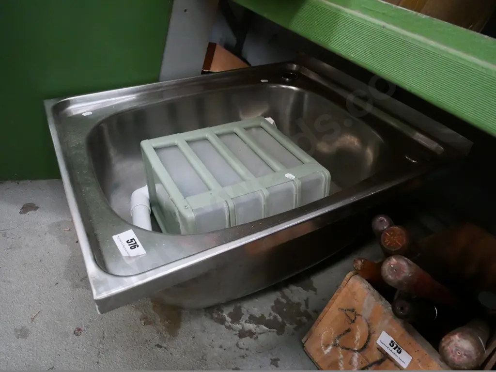 stainless steel laundry sink and small set of plastic drawers Image 1++