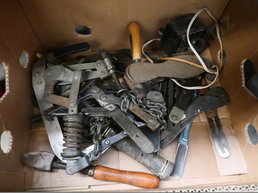 box of plumber's wrenches, valve pullers, hammers, etc. Image 1++