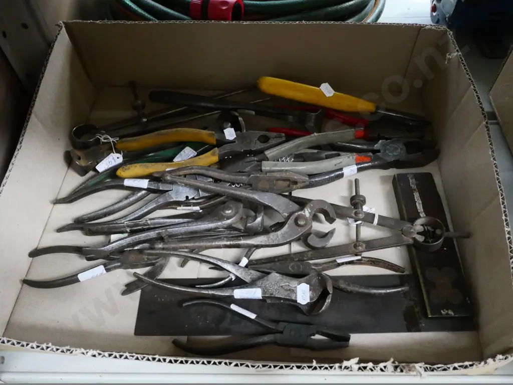 box of pliers, builder's level, nail pinches, etc. Image 1++