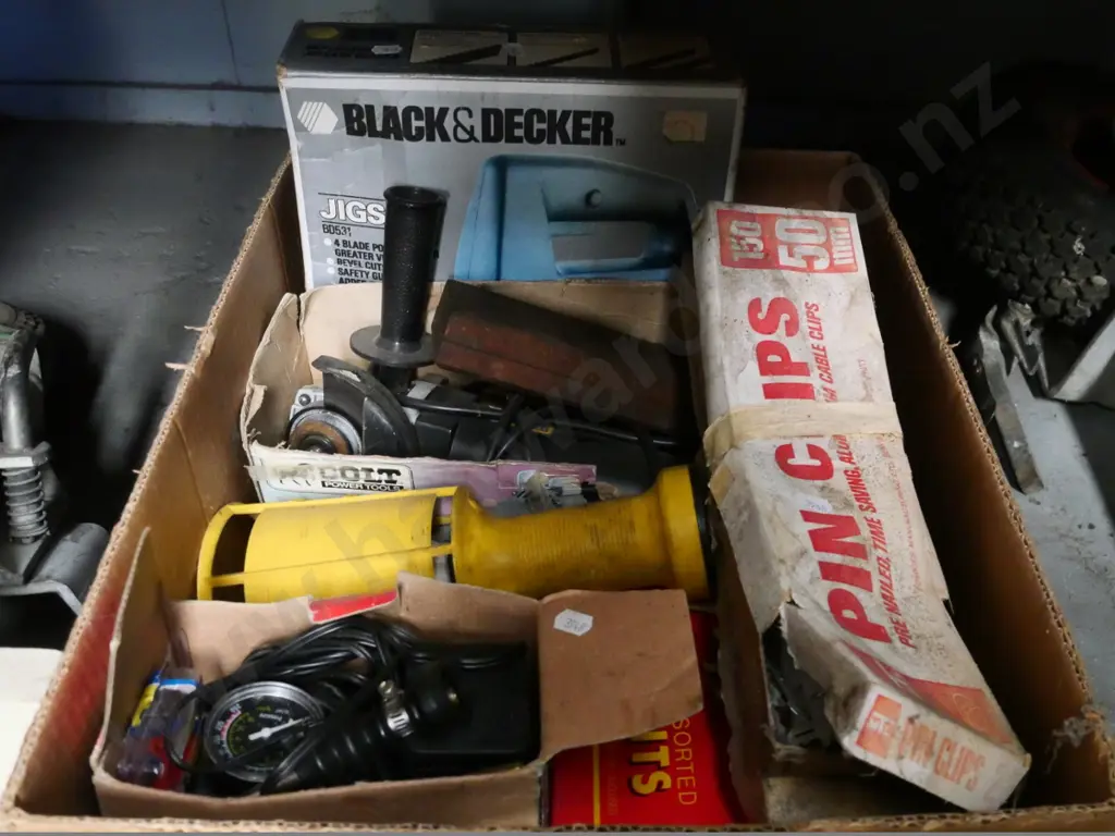 box of trouble light, angle grinder, pin clips, etc. Image 1++
