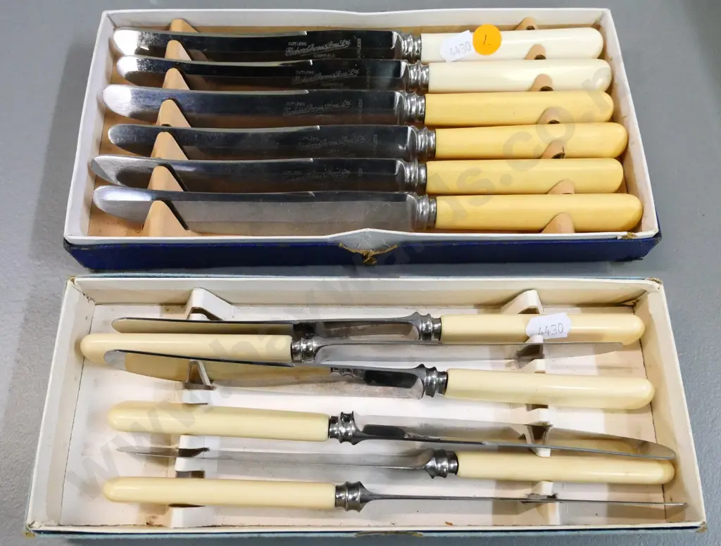 2 boxed sets of bone-handled dinner knives - one set has 4 discoloured handles Image 1++