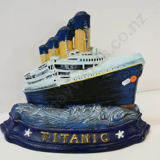 painted cast iron Titanic door stop - Wright Studios moulded into back