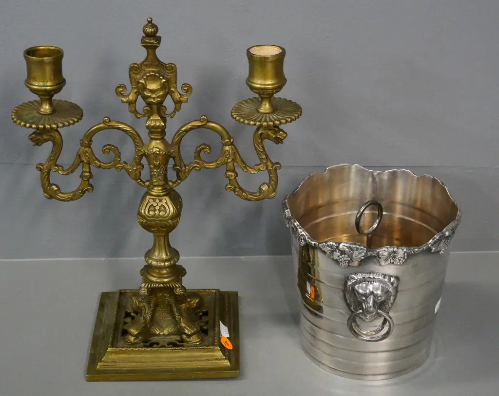 cast brass candelabrum H-290 W-230 and a silver plated ice bucket with lifter and lion head handles Image 1++