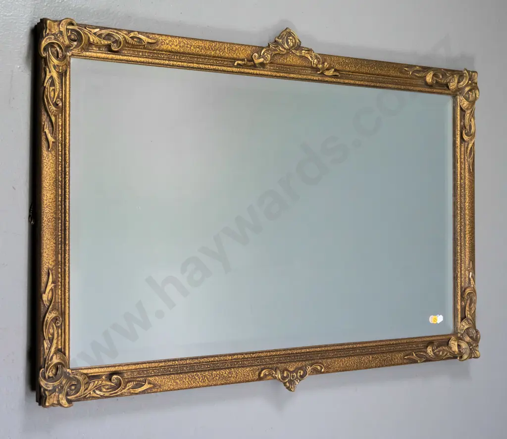 ornate gilt-framed bevelled wall mirror - minor cracks and damage to frame trim H-600 W-900 Image 1++