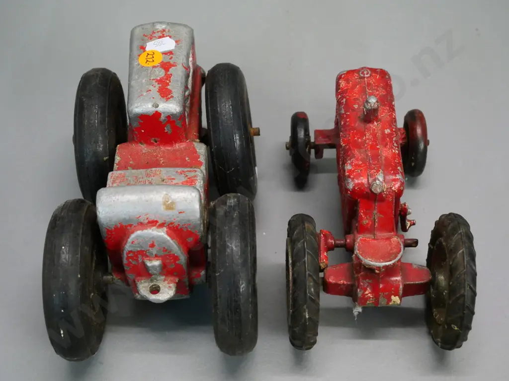 2 vintage die-cast tractors - smaller has damage and missing parts, front wheels likely not original on larger L-200 Image 1++