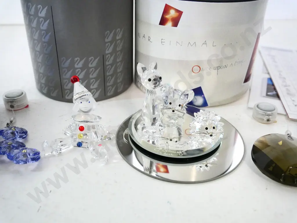 4 boxed Swarovski crystal ornaments: 2 suncatchers, clown & set of 3 animals w/mirror base (whiskers have come off cat) Image 1++