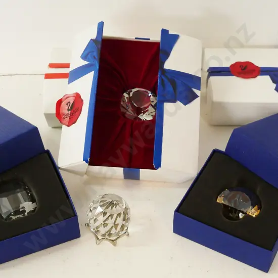 4 boxed Swarovski crystal ornaments - faceted crystal on stand and 3 others