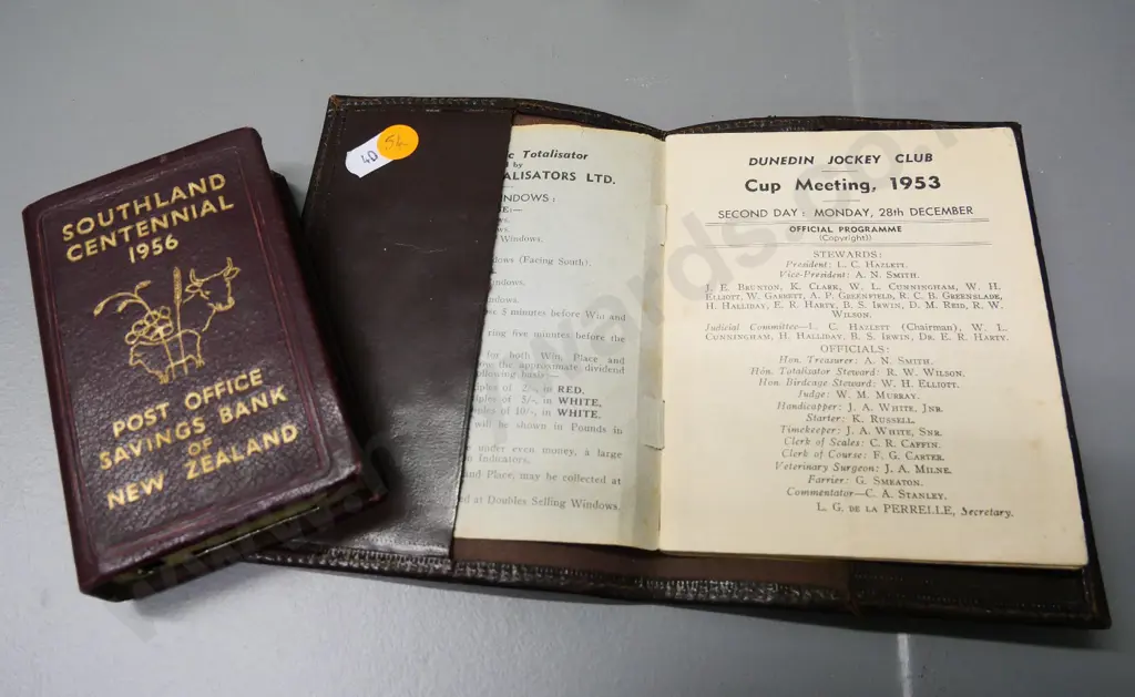 1956 Southland Centennial Post Office Savings Bank money box, embossed leather case & 1953 Dunedin Jockey Club race book Image 1++