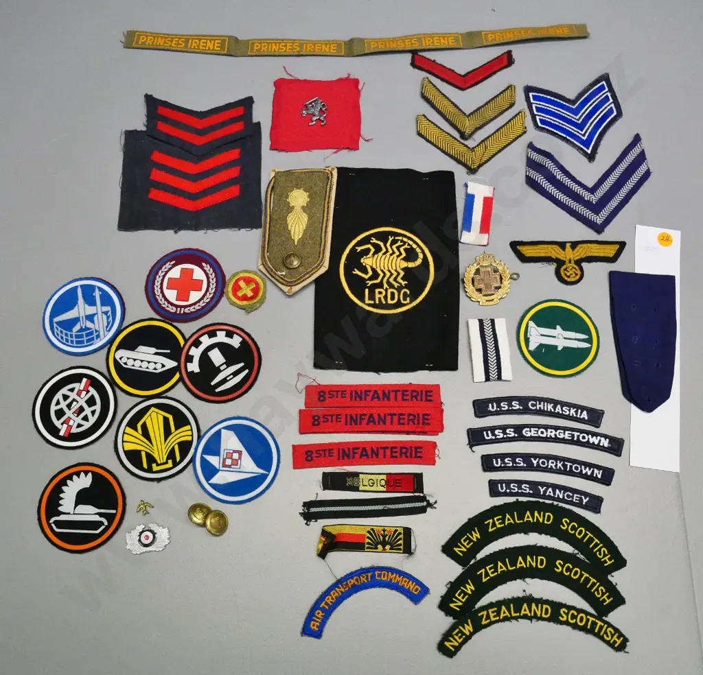 assorted military fabric badges, bars and insignia, buttons etc. plus some first day covers, matchboxes etc. Image 1++
