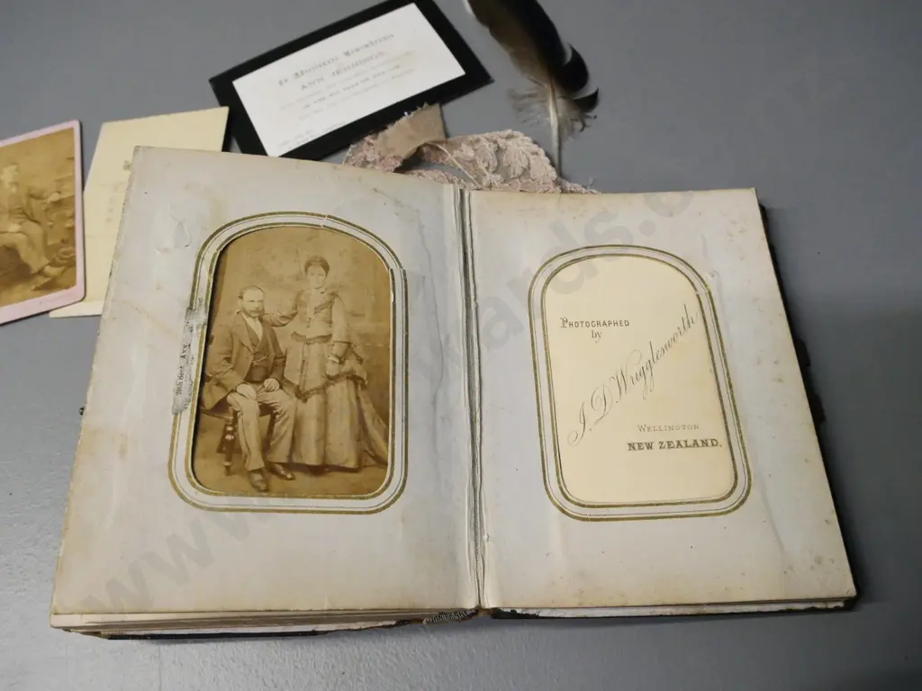 vintage photo album full of cartes de visite and photographs, lace, a feather etc. - Nelson, Hokitika, Dunedin etc Image 1++