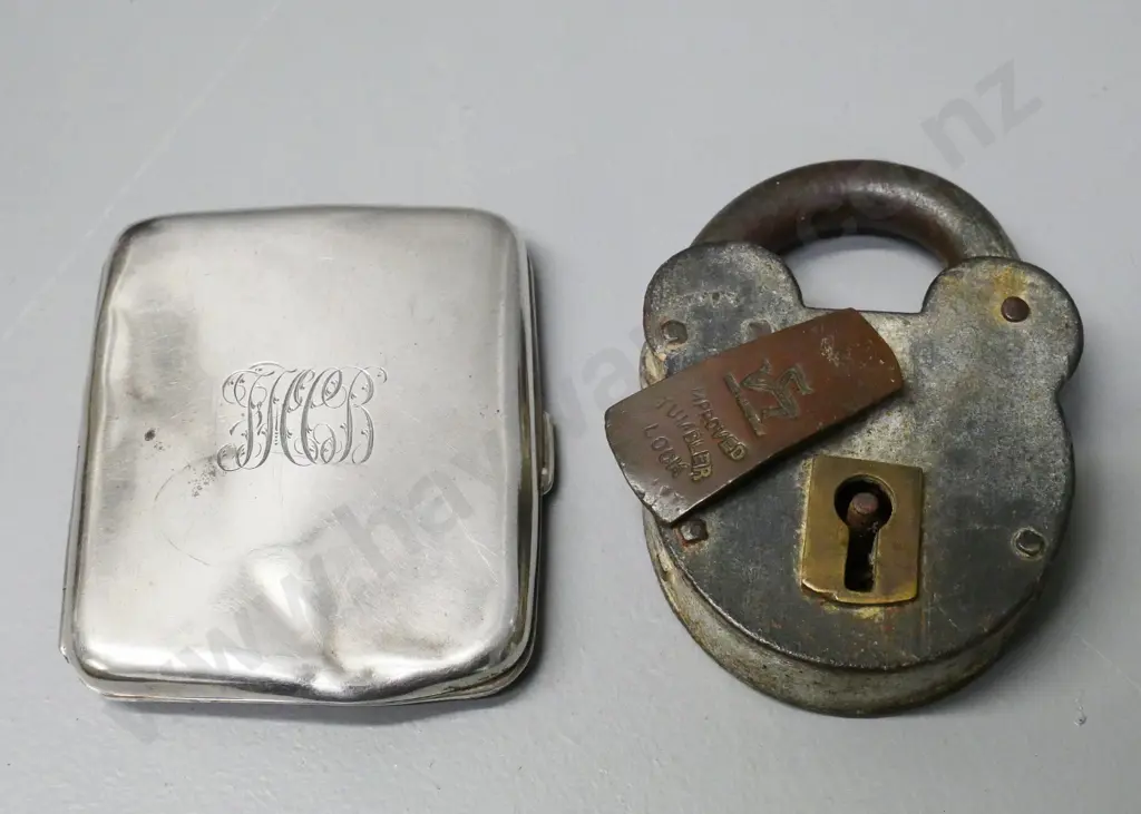 sterling silver cigarette case in dented restorer's condition, and a vintage heavy duty padlock, no key Image 1++