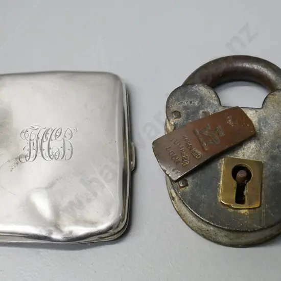 sterling silver cigarette case in dented restorer's condition, and a vintage heavy duty padlock, no key