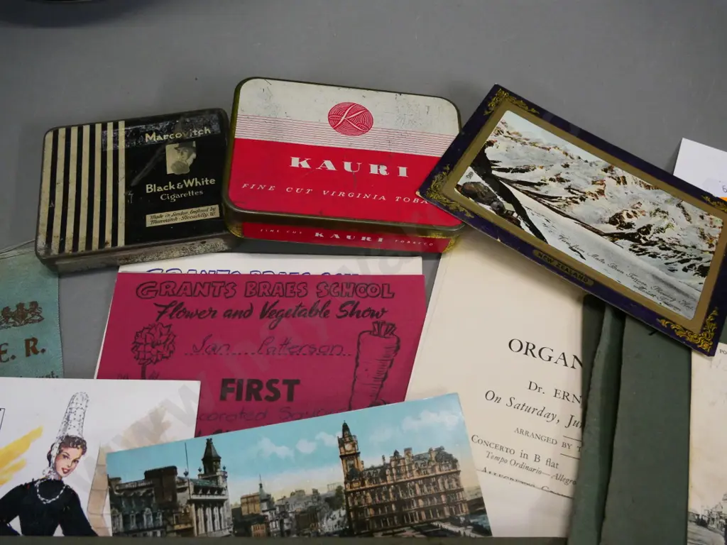 collection of photos, tins, greeting cards, portraits printed on fabric, early NZ postcards on torn album sheets etc. Image 1++