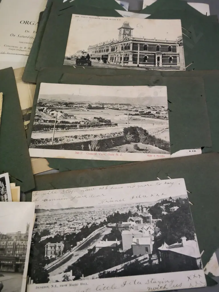 collection of photos, tins, greeting cards, portraits printed on fabric, early NZ postcards on torn album sheets etc. Image 1++
