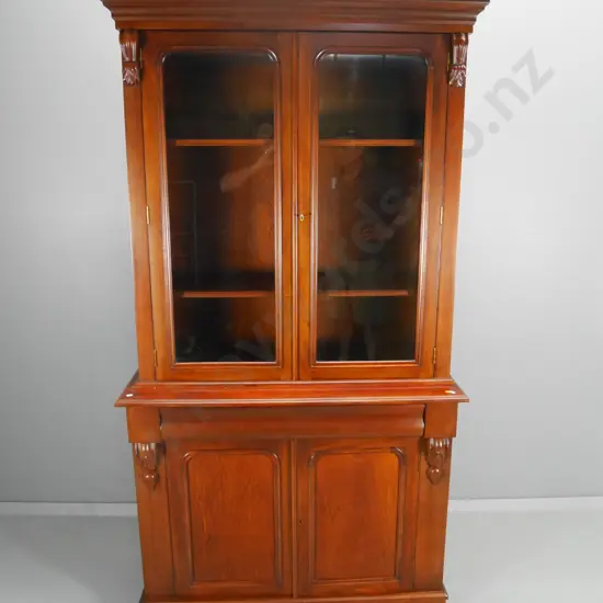 reproduction mahogany chiffonier bookcase w/carved corbels, 2 door & 1 drawer in base, 3 doors on top H2000 W1060 W420
