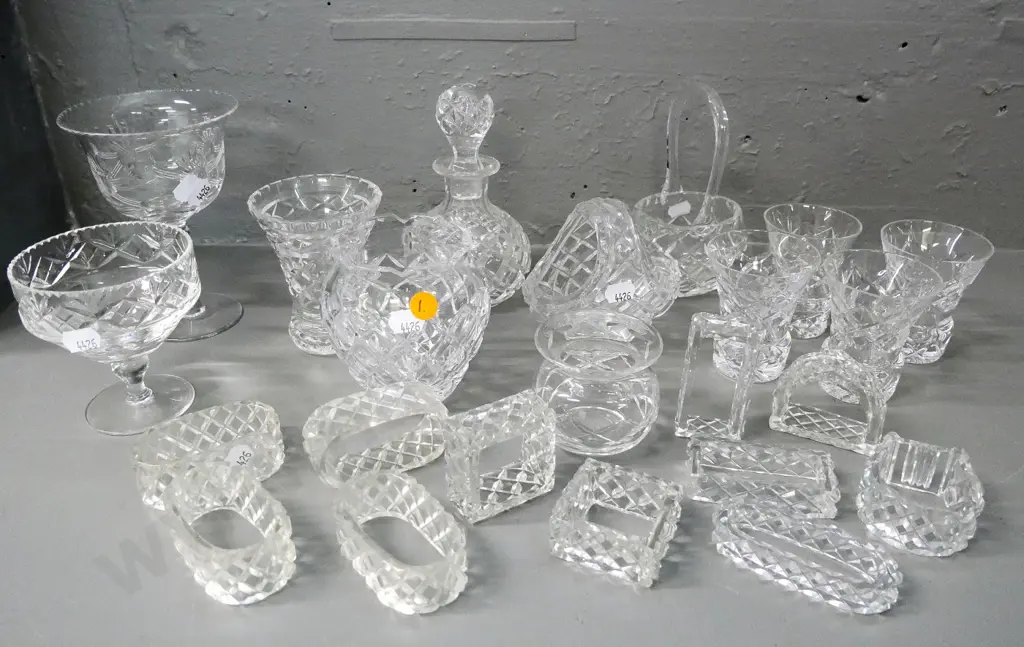 large assortment of crystal items -  3 vases, 2 baskets, 11 napkin rings, sauce bottle etc. Image 1++