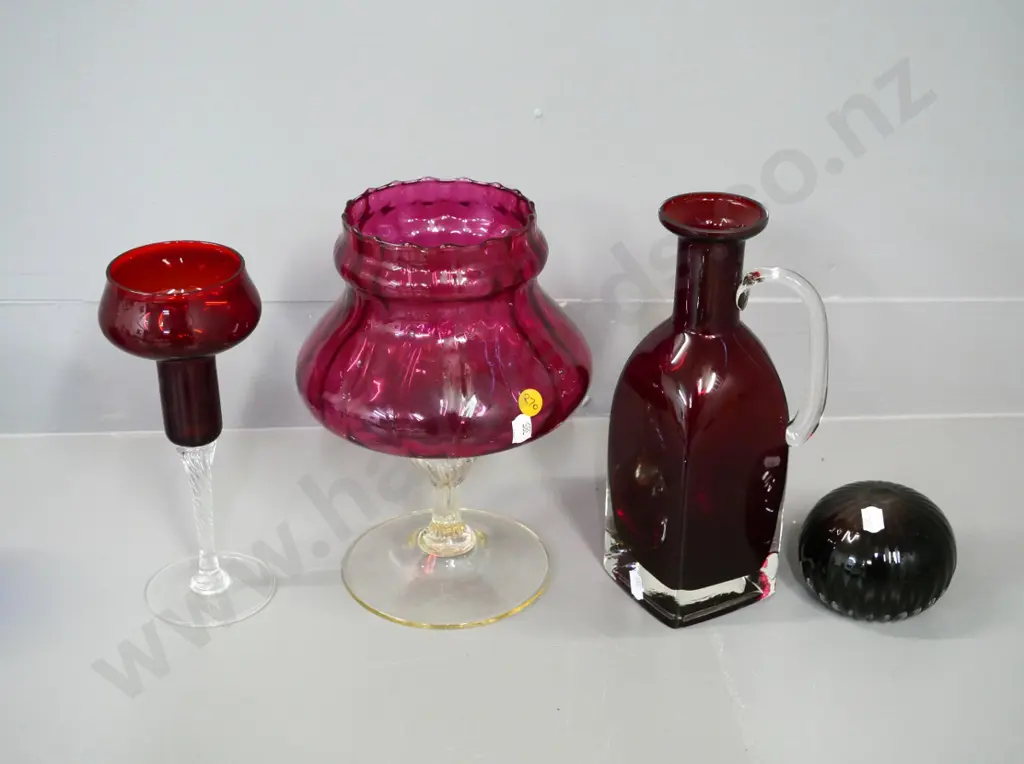 4 coloured glass items - comport H-235, candle holder and decanter (no stopper) and paperweight with S. Fuchs Chch label Image 1++