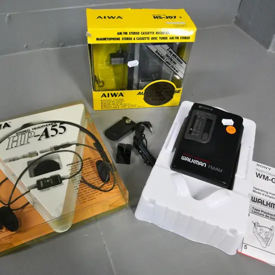 retro Sony Walkman GX35  and Aiwa HS-J07 cassette recorders, pair of Aiwa headphones, accessories