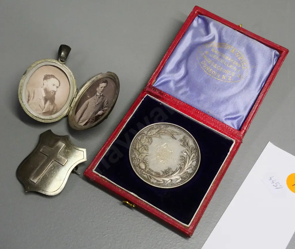 cased 1874 Otago Girls' High SchoolDux medal - M.S. Maitland, unmarked locket w/2 photos & a cross & shield brooch Image 1++