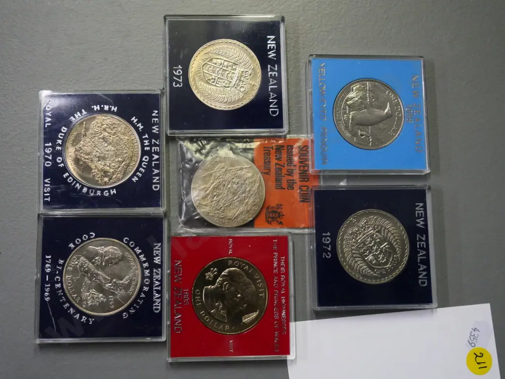 7 New Zealand commemorative collector coins - 1969 Bicentenary, 1983 Royal visit, 1988 penguin, etc. Image 1++