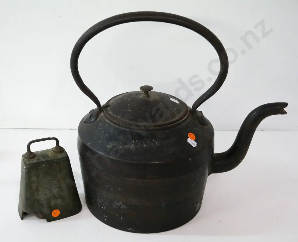 large cast iron kettle H-380 L-380, some pitting and rust - and a cast metal cowbell with piece broken off Image 1++
