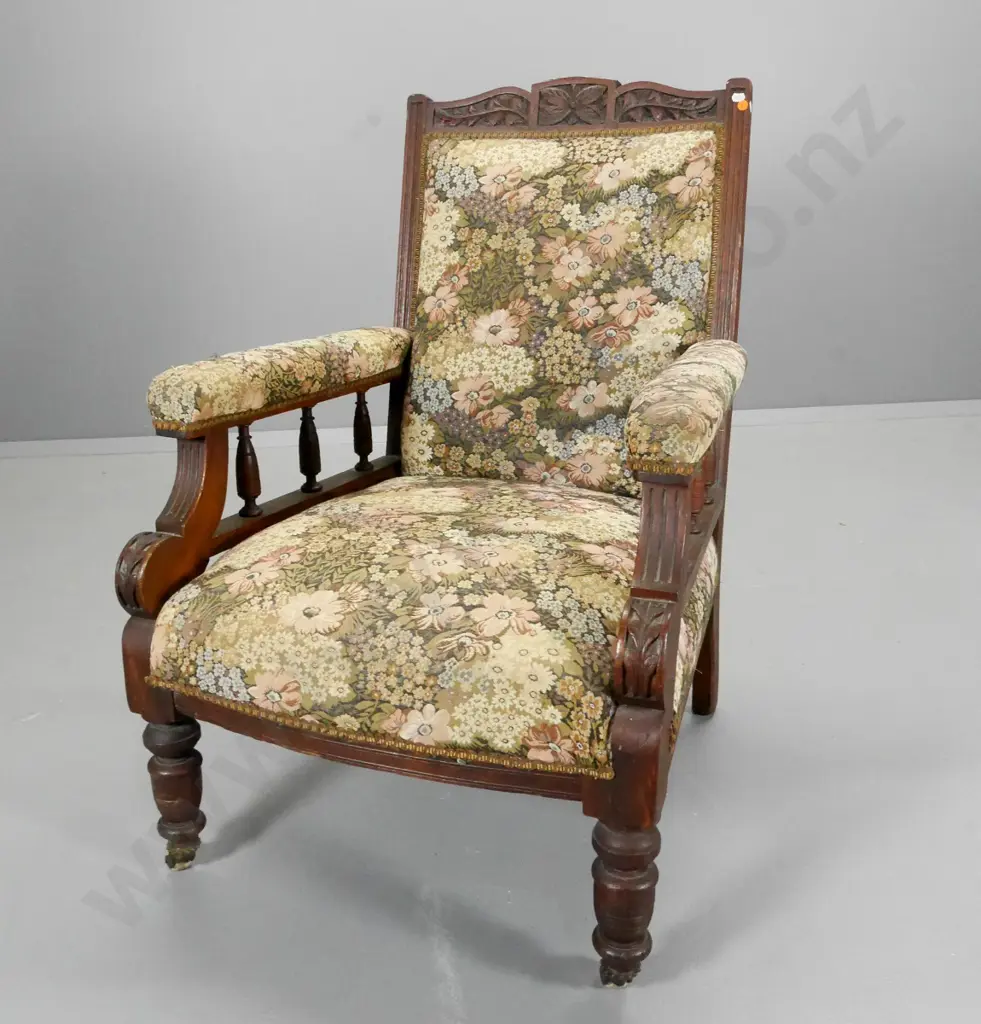Edwardian armchair w/carved top rail, spindle sides, porcelain casters, some fading to tapestry H940 W640 D700 Image 1++