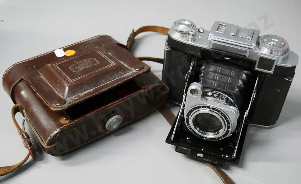 Zeiss Super Ikonta 533/16 6x6 film camera with Zeiss Opton Tessar 80mm f/2.8 lens, leather case Image 1++