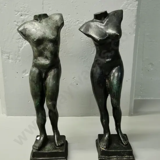 pair of male & female cast metal torso figures - some dents to base of male figure. H-430