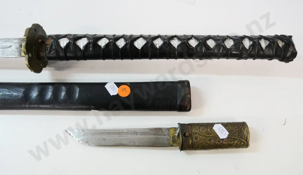 Japanese style sword L-1030 with leather sheath, smaller knife inset into handle of larger - wear & corrosion Image 1++